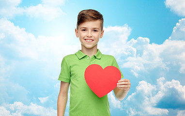 Image showing happy boy holding red heart shape