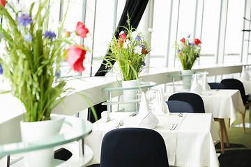 Image showing decorated tables at restaurant