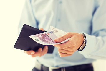 Image showing close up of businessman hands holding money