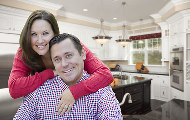 Image showing Happy Couple In Beautiful New Kitchen