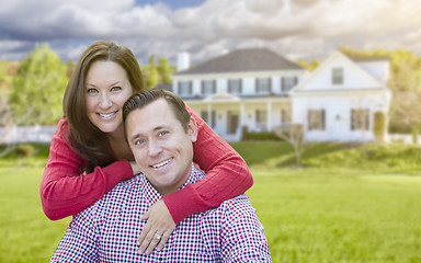 Image showing Happy Couple Outdoors In Front of Beautiful House