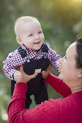 Image showing Little Baby Boy Having Fun With Mommy Outdoors