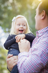 Image showing Adorable Little Girl Having Fun With Daddy Outdoors