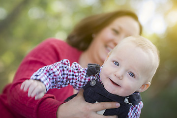 Image showing Little Baby Boy Having Fun With Mommy Outdoors