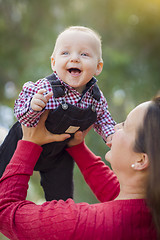 Image showing Little Baby Boy Having Fun With Mommy Outdoors