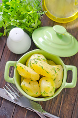 Image showing boiled potato in green bowl