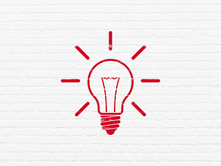 Image showing Finance concept: Light Bulb on wall background