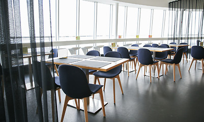 Image showing restaurant interior with tables and chairs