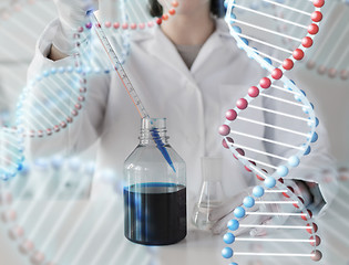 Image showing close up of scientist making test in lab