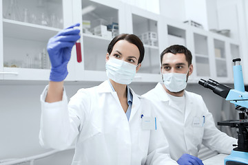 Image showing young scientists making test or research in lab