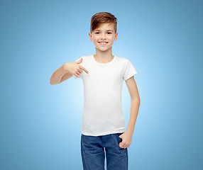 Image showing happy boy pointing finger to his white t-shirt