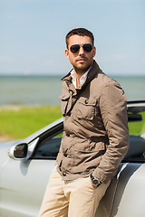 Image showing man near cabriolet car outdoors