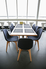 Image showing restaurant interior with table and chairs