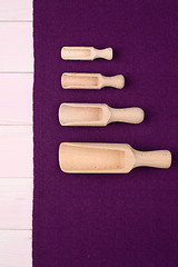 Image showing Kitchenware on purple towel