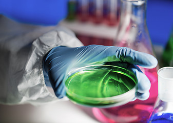 Image showing close up of scientist making test in laboratory