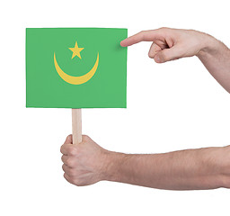 Image showing Hand holding small card - Flag of Mauritania