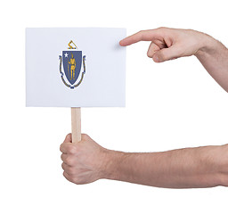 Image showing Hand holding small card - Flag of Massachusetts