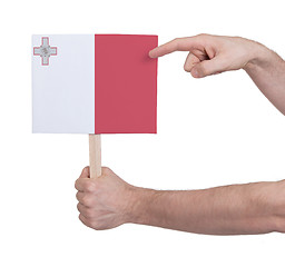 Image showing Hand holding small card - Flag of Malta