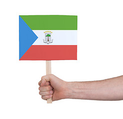 Image showing Hand holding small card - Flag of Equatorial Guinea