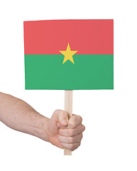 Image showing Hand holding small card - Flag of Burkina Faso