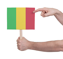 Image showing Hand holding small card - Flag of Mali