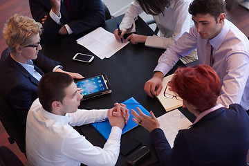 Image showing business people group on meeting at modern bright office