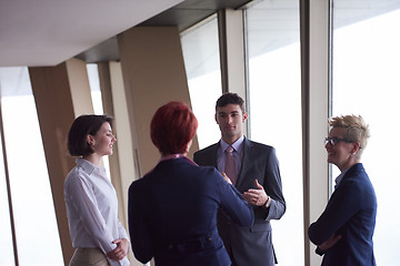 Image showing business people group on meeting at modern bright office