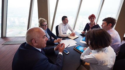 Image showing business people group on meeting at modern bright office