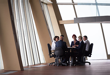 Image showing business people group on meeting at modern bright office