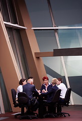 Image showing business people group on meeting at modern bright office