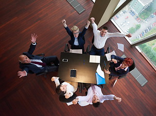 Image showing top view of business people group throwing dociments in air