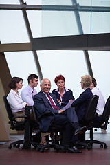 Image showing business people group on meeting at modern bright office