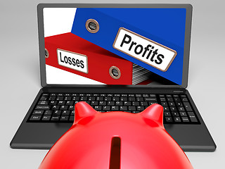 Image showing Profits And Looses Files On Laptop Shows Expenses