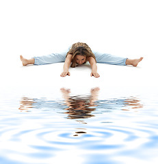 Image showing upavistha konasana wide-angle seated forward bend on white sand