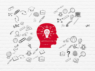 Image showing Learning concept: Head With Light Bulb on wall background