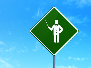 Image showing Studying concept: Teacher on road sign background
