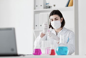 Image showing close up of scientist making test in lab