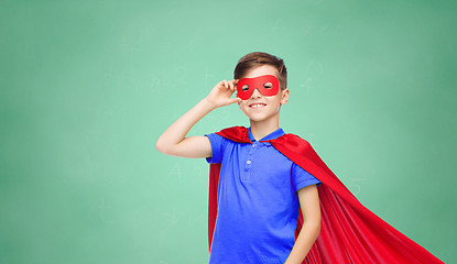 Image showing boy in red superhero cape and mask