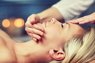 Image showing close up of woman having face massage in spa