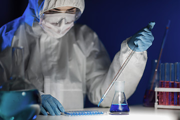 Image showing close up of scientist making test in lab