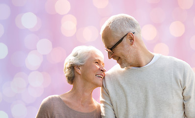 Image showing happy senior couple looking at each other