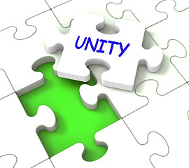 Image showing Unity Puzzle Shows Partner Team Teamwork Or Collaboration