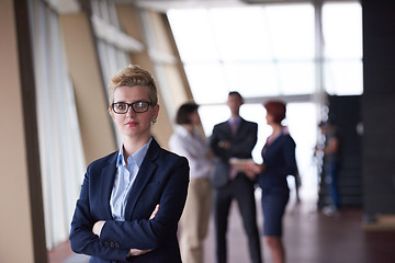 Image showing business people group, woman in front  as team leader