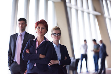 Image showing diverse business people group with redhair  woman in front