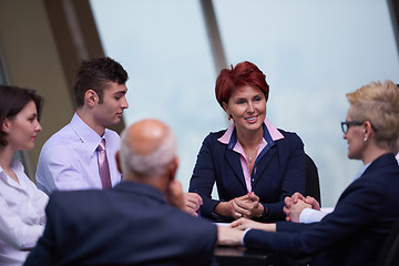 Image showing business people group on meeting at modern bright office