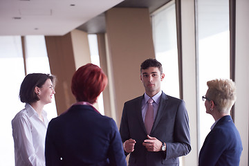 Image showing business people group on meeting at modern bright office