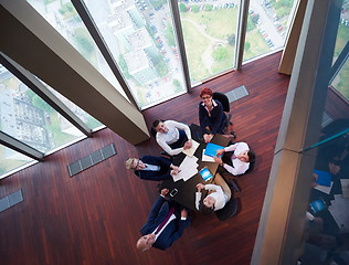 Image showing top view of business people group throwing dociments in air