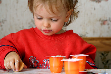 Image showing Eating yogurt