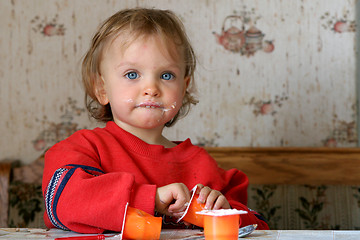 Image showing Eating yogurt