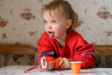 Image showing Eating yogurt